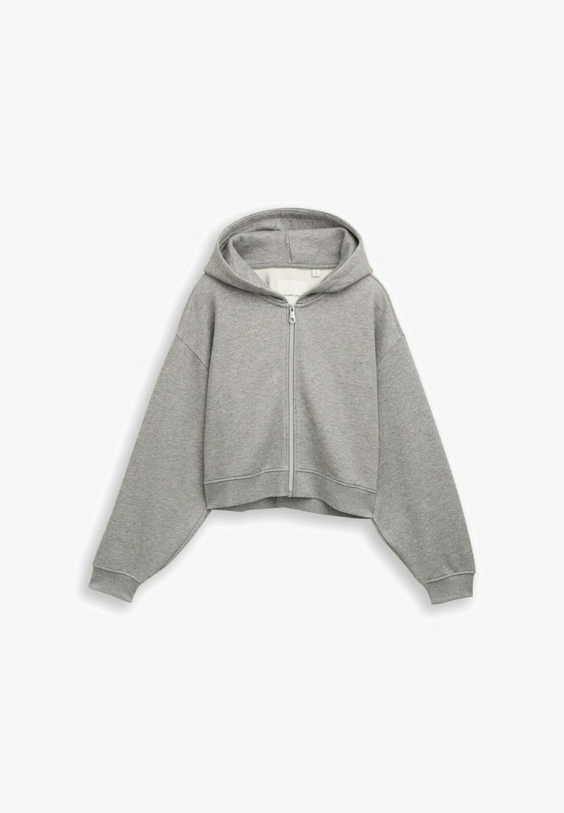 Haut à capuche gris court avec une fermeture éclair à l'avant, fabriqué en tissu doux. Il présente une capuche, des épaules tombantes et des poignets et un ourlet côtelés.