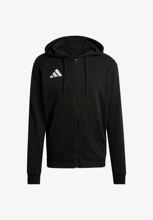 Sudadera negra con cremallera, bolsillos frontales, capucha con cordón y logo blanco de tres rayas en la parte superior izquierda del pecho.