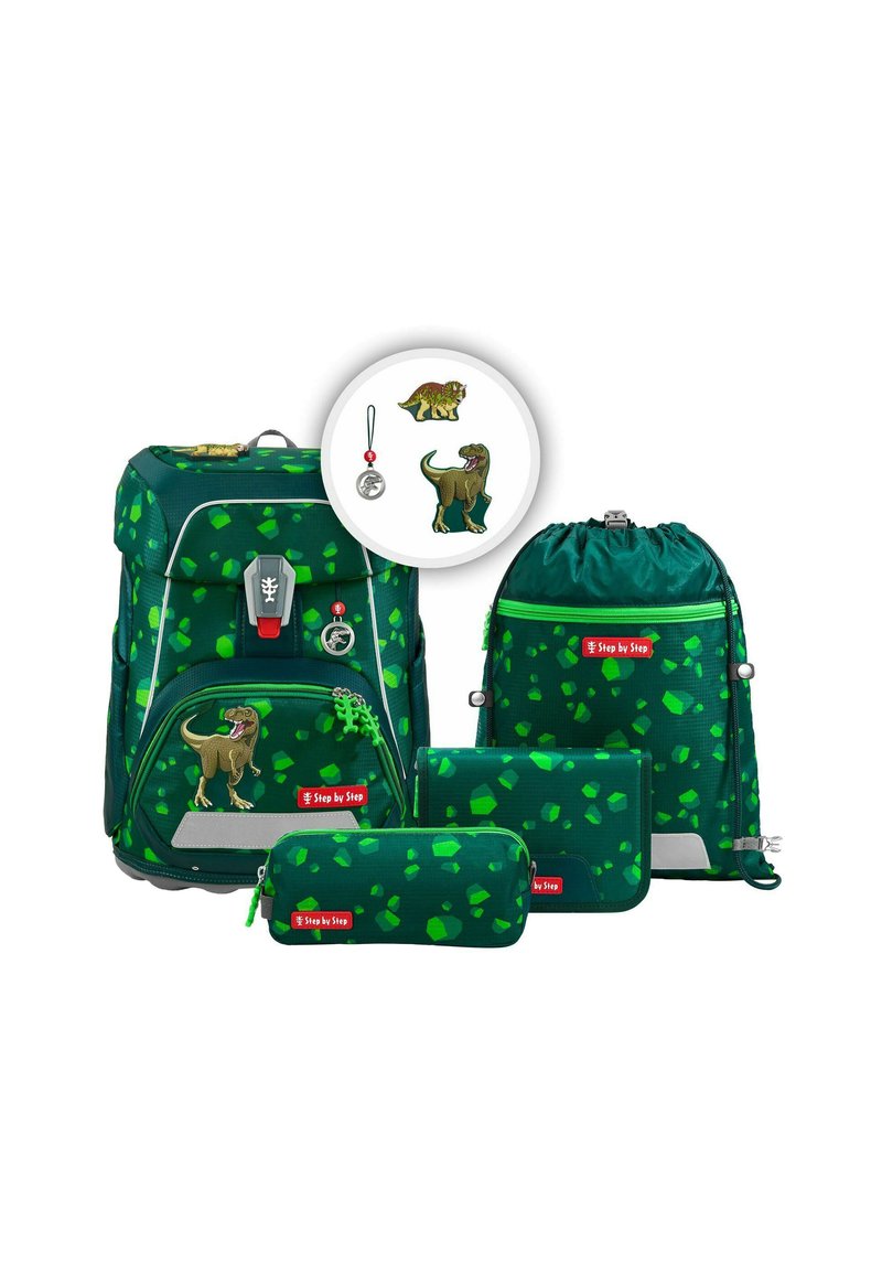 Grünes Rucksack-Set mit Dinosaurier-Design, strukturiertem Finish und verstreuten Mustern. Enthält verschiedene Accessoires: Täschchen und einen Beutel mit Kordelzug.