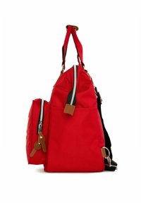 Red fabric bag with two compartments, black straps, leather accents, and silver zippers. Rounded shape with side pocket detail.