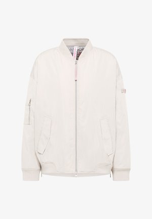 Elfenglänzende Bomberjacke mit Frontreißverschluss, zwei seitlich schrägen Taschen, gerippten Bündchen und Kragen sowie einer Reißverschlusstasche am linken Ärmel.