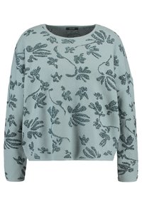 Hellblaues Sweatshirt mit langen Ärmeln, das ein florales Muster in Dunkelblau und Glitzerakzenten aufweist. Weicher Stoff und lockere Passform.