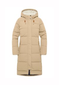 Beige lång vadderad kappa med huva, med quiltad design, fickor på sidorna och dragsko-detaljer. Mjuk innervadd synlig.