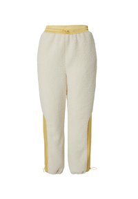 Cremefarbene Fleece-Jogginghosen mit gelben Seitenpaneelen. Sie verfügen über eine strukturierte Oberfläche, einen elastischen Bund und eine Kordel zur individuellen Anpassung.