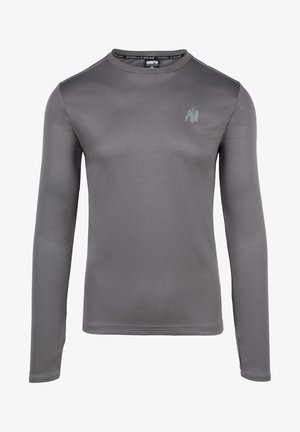 Siva dolgi rokav športna majica iz gladkega materiala, s krožnim ovratnikom in diskretnim logotipom na prsih.