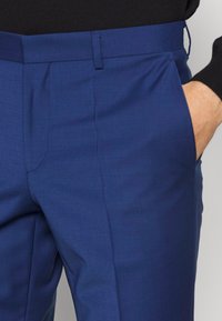 HUGO GETLIN - Anzughose - open blue