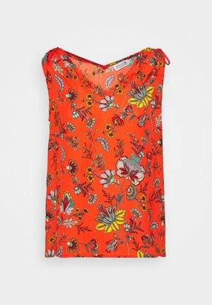 Top arancione brillante senza maniche con stampa floreale multicolore e piccolo dettaglio con fiocco sulla spalla.