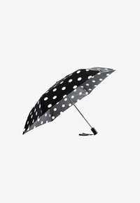 Selected, black cream spot