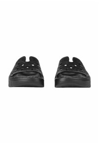 Scarpe slip-on nere in gomma con design aperto sulla punta, dotate di numerosi fori di ventilazione e una suola testurizzata per una migliore aderenza.
