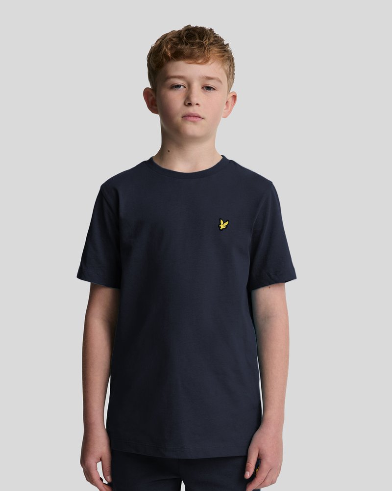 T-shirt en coton bleu marine avec un col rond et des manches courtes, orné d'un petit logo jaune sur la poitrine gauche.
