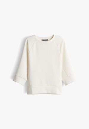 Sweat-shirt blanc à manches longues avec manches raglan, poignets et taille côtelés, présenté à plat sur un fond blanc.