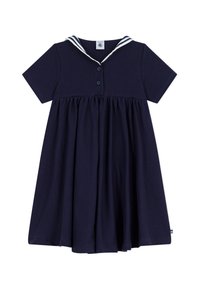 Φόρεμα σε ναυτικό μπλε χρώμα με κοντά μανίκια, γιακά ναύτη με λευκές ρίγες, τρία κουμπιά στο μπούστο και φούστα με πιέτες.