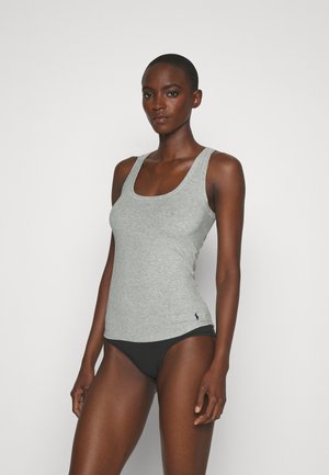 Gray tank top made of cotton, featuring a scoop neckline and fitted design. Worn with black bikini bottoms, has a small logo detail on the side.