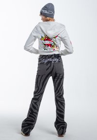 Ed Hardy FLAMING TIGER  - Vaqueros a campana - black