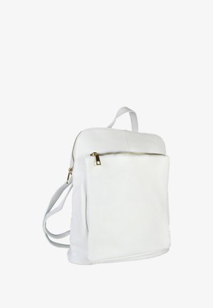 White leather backpack with gold zipper, front pocket, and adjustable shoulder straps against a white background.