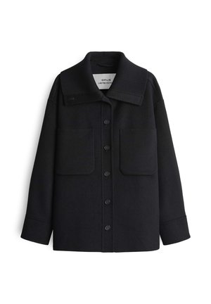 Dunkelnavy Wolljacke mit breitem Kragen, vorderen Knöpfen und zwei großen aufgesetzten Taschen. Der strukturierte Kragen kontrastiert mit dem glatten Stoff.