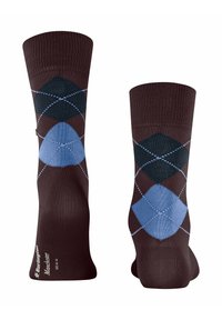 Chaussettes argyle marron avec des motifs de diamants bleus et verts foncés, agrémentées de coutures blanches discrètes. Fabriquées en tissu extensible pour un confort optimal.