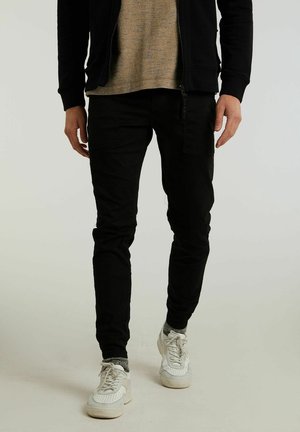 Spodnie materiałowe