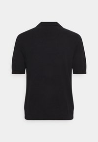 Polo shirt noir à manches courtes avec col, présenté de dos sur un fond blanc.