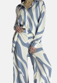 Elara SET - Pantaloni - blau