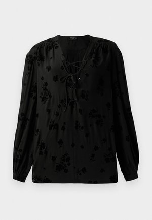 Black blouse made of soft fabric, featuring a lace-up neckline and floral pattern. Long, puffed sleeves and a relaxed fit complete the design.