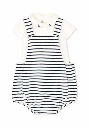 Rampers dla niemowląt z granatowymi i białymi poziomymi paskami, przymocowanymi szelkami oraz białą koszulą z kołnierzykiem i małym haftem kotwicy.