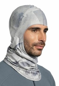 Gray multifunctional headwear with a soft, smooth texture. Features a geometric pattern and snug fit, designed for warmth and versatility.