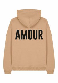 Felpa con cappuccio beige con la scritta nera ricamata "AMOUR" sulla schiena. Presenta polsini e orlo a coste, con una morbida texture del tessuto.