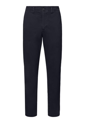 Tmavě modré úzké kalhoty se zapínáním na knoflík a zip, poutky na opasek a bočními kapsami, zobrazené zepředu na bílém pozadí.