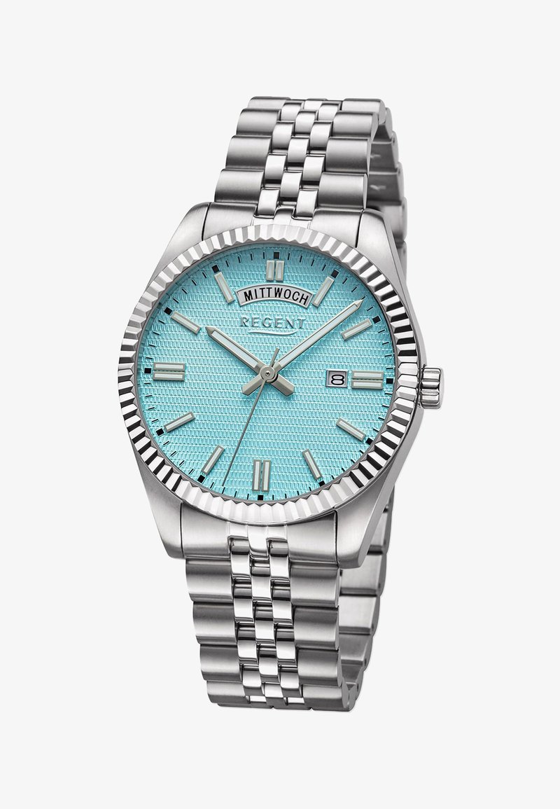 Montre en acier inoxydable argenté avec un cadran texturé bleu-vert, des index horaires argentés et un affichage de la date. Elle est dotée d'un bracelet à maillons métalliques et d'une lunette cannelée.