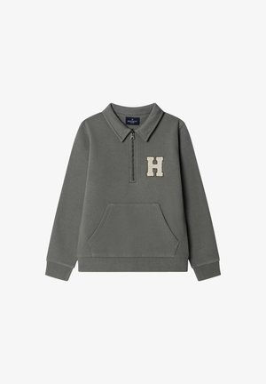 Sudadera gris con cremallera en el cuello, bolsillo frontal y logo "H" bordado. Tejido suave, detalles de puños y dobladillo acanalados.