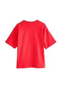 T-shirt rossa in cotone con maniche corte, scollo rotondo e vestibilità rilassata. Tessuto morbido e design semplice senza motivi o dettagli.