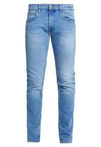 Ljusblå denimjeans med slim fit, som har fem fickor, dragkedja och diskret blekning längs benen.