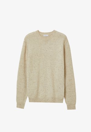 Beige knitted crewneck sweater with long sleeves and ribbed cuffs and hem, speckled with subtle darker spots.