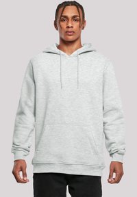 Gray cotton hoodie with a front pocket, a drawstring hood, and ribbed cuffs; soft texture and relaxed fit.