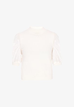 Krátký rukávový top v krémové barvě s žebrovaným stojáčkem. Průsvitné balónové rukávy s květinovým vzorem. Měkký, lehký materiál.