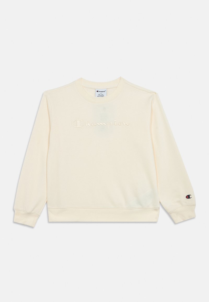 Φανελάκι κρέμα με κεντημένο λογότυπο "Champion", στρογγυλή λαιμόκοψη, μακριά μανίκια, ριμπ μανσέτες και τελείωμα. Περιλαμβάνει διακοσμητικό λογότυπο στο μανίκι.