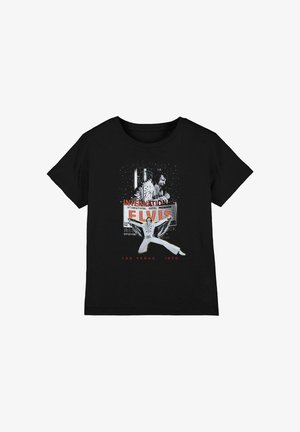 Black T-shirt with graphic of Elvis Presley singing and dancing in a white jumpsuit, with "International Las Vegas 1970" text.