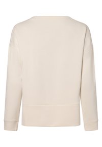 Sudadera beige con cuello redondo y mangas largas. Presenta una textura suave y un ajuste relajado, con costuras sutiles a lo largo del dobladillo y los puños.