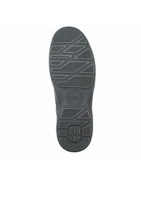 Semelle de chaussure en caoutchouc noir, présentant un motif de texture avec des motifs en zigzag et rectangulaires, un logo central et un design circulaire près du talon.