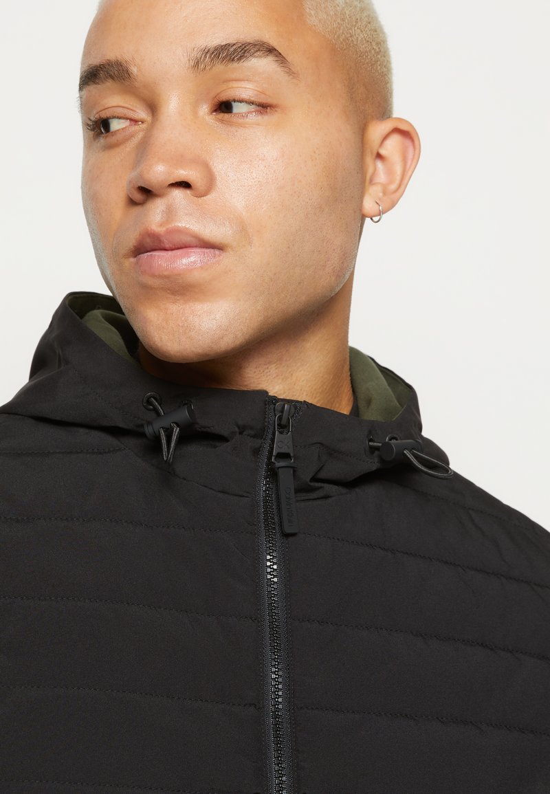 Descubrir 89+ imagen calvin klein mixed media hooded jacket Thptnganamst.edu.vn