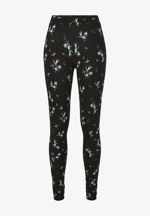 Schwarze Leggings mit floralen Mustern in Weiß, Blau und Rosa Akzenten. Hergestellt aus dehnbarem Stoff mit einer glatten Textur.