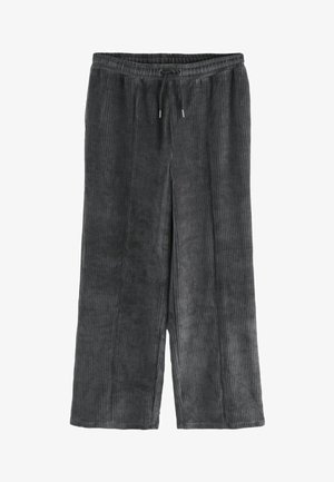 Hallidega hallid kootud püksid, millel on laiad sääred, kummiga vöökoht ja vertikaalne ribakujundus. Pehme materjal ja vabalt langetav lõige.