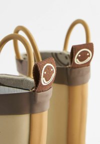 Next PANDA HANDLE - Bottes en caoutchouc - yellow smiley