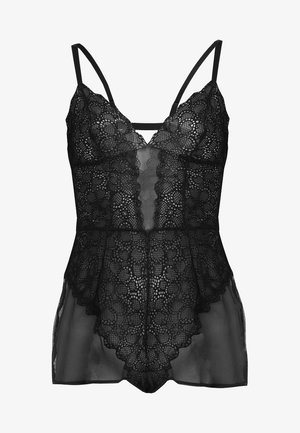 Schwarzes Spitzen-Camisole mit verstellbaren Trägern, das ein florales Muster, durchscheinenden Stoff und gewellte Kanten aufweist, entworfen in einer lockeren Passform.