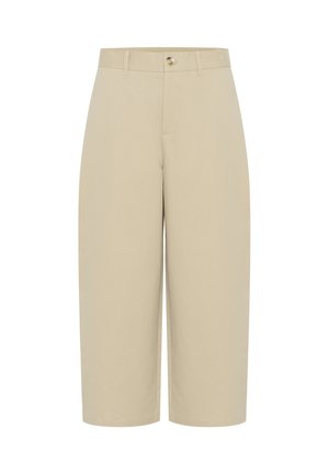 Pantalon beige taille haute, jambes larges et courtes, avec passants pour ceinture et une fermeture frontale par un seul bouton.