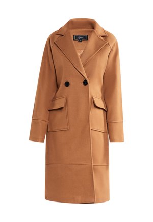 Dubbelzijdige, camel-kleurige jas gemaakt van zacht materiaal. Voorzien van grote zijzakken, een notch lapel en zwarte knopen voor sluiting.