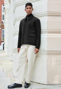 Next Könnyű dzseki - black zip