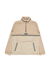 Beige fleece trøje med halvlukket krave, der har et mønstret bånd hen over brystet og to forlommer med lignende detaljer.