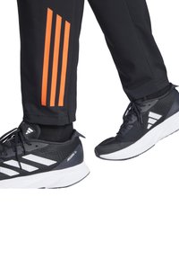 adidas Performance TIRO COMPETITION PRÄSENTATIONS - Jogginghose - schwarzrot